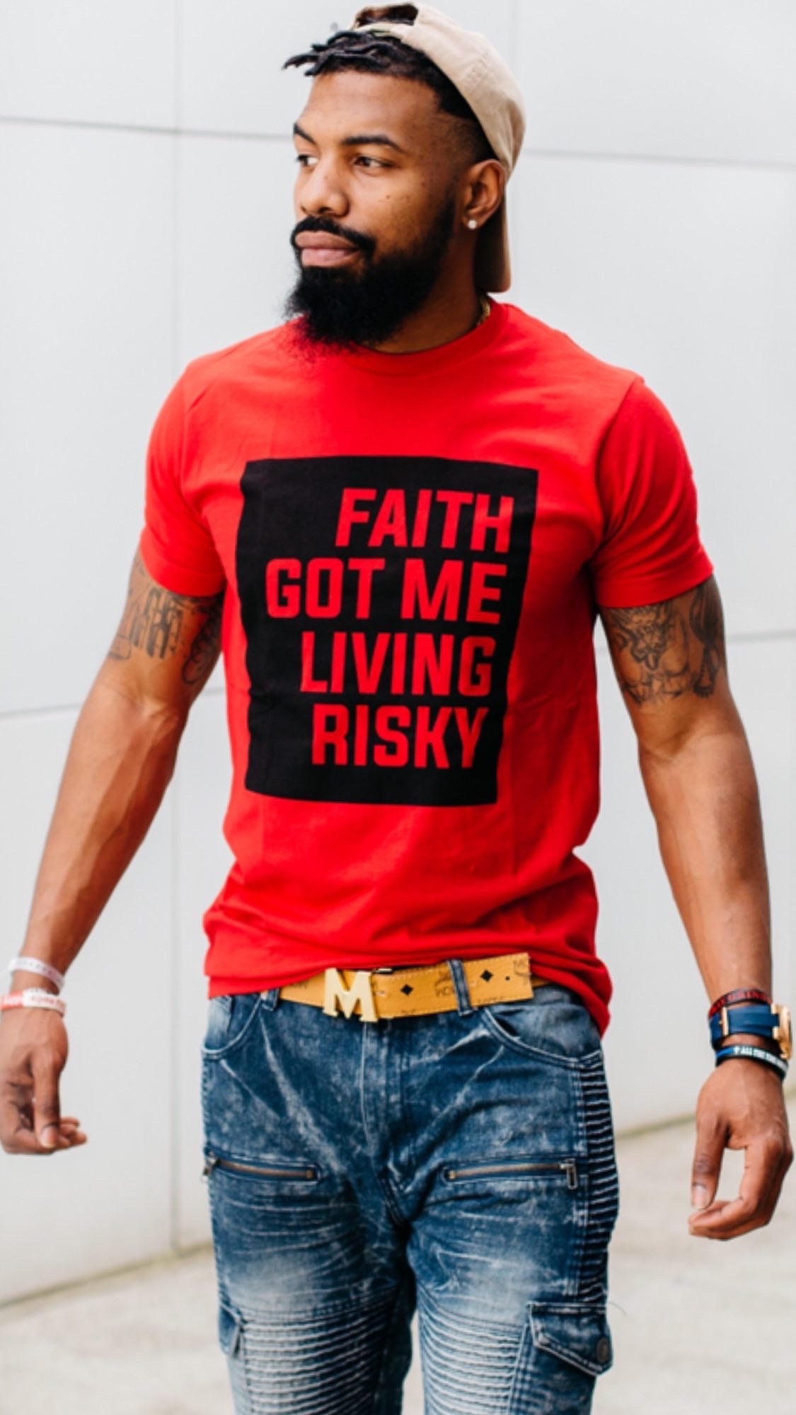 Faith Got Me Living Risky red tee - lifestyle shot