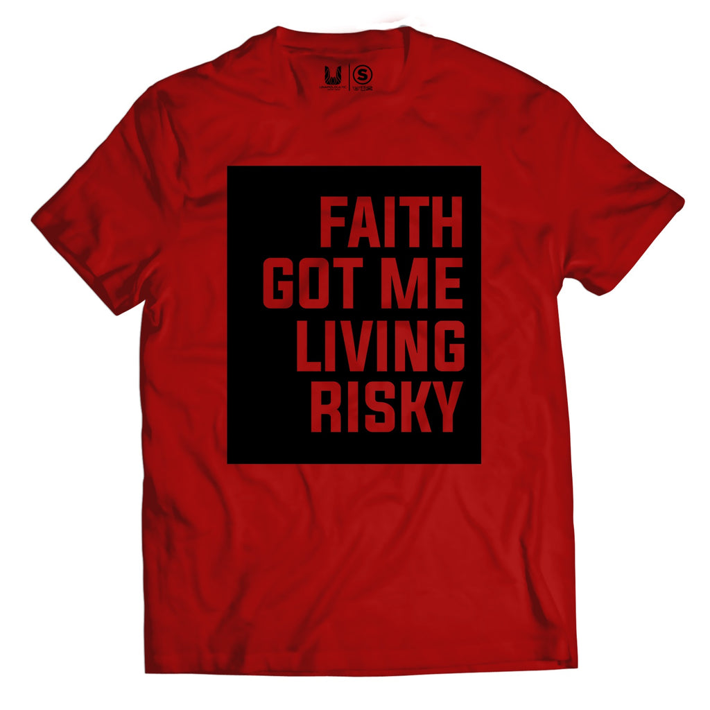 Faith Got Me Living Risky red tee - flat lay